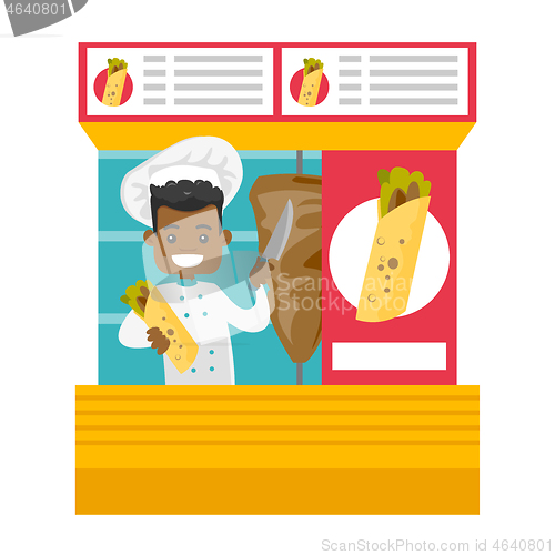 Image of African-american chef preparing shaurma in a kiosk