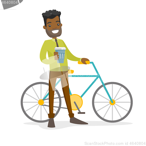 Image of African-american businessman riding a bicycle.