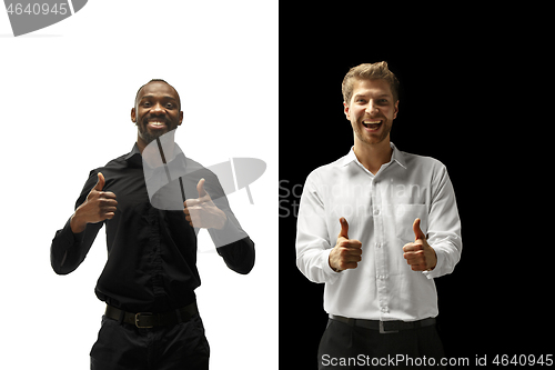 Image of success happy afro and caucasian men. Mixed couple. Human facial emotions concept.