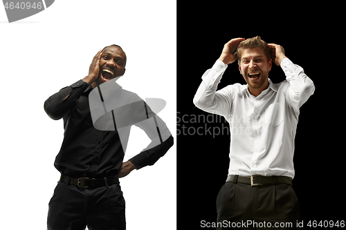 Image of success happy afro and caucasian men. Mixed couple. Human facial emotions concept.