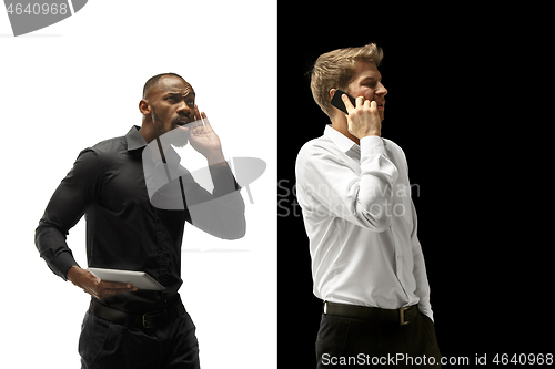 Image of success happy afro and caucasian men. Mixed couple. Human facial emotions concept.