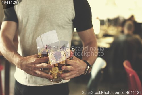 Image of software developer eating a fruit salad