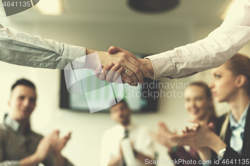 Image of business womans handshake