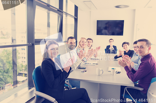 Image of Group of young people meeting in startup office