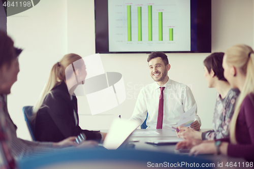 Image of young business people group on meeting at office