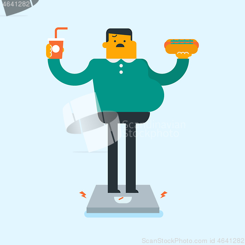 Image of Man standing on scales with fast food in hands.