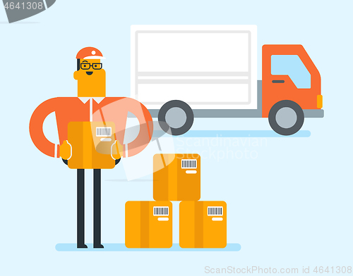 Image of Caucasian delivery man carrying cardboard box.