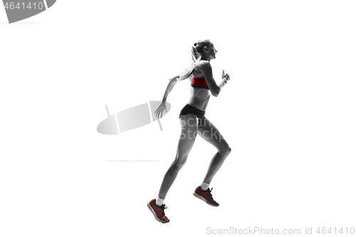 Image of one caucasian woman running on white background