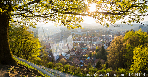 Image of Panoramic view of Ljubljana, capital of Slovenia. Roooftops of Ljubljanas old medieval city center seen from Ljubljanas castle park at sunset