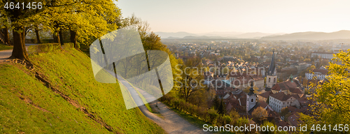 Image of Panoramic view of Ljubljana, capital of Slovenia. Roooftops of Ljubljanas old medieval city center seen from Ljubljanas castle park at sunset