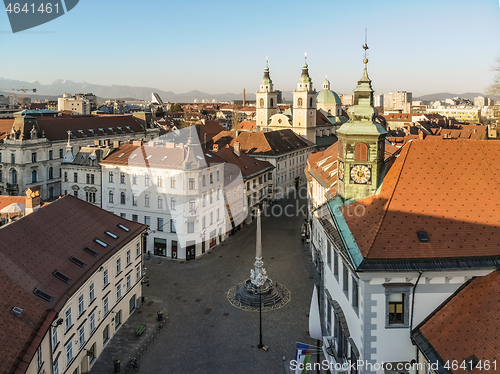 Image of Panoramic aerial view of Town Square in Ljubljana, capital of Slovenia, at sunset. Empty streets of Slovenian capital during corona virus pandemic social distancing measures in 2020