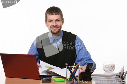 Image of smiling office worker works with documents on a white background