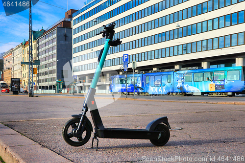 Image of E-Scooter Parked in City