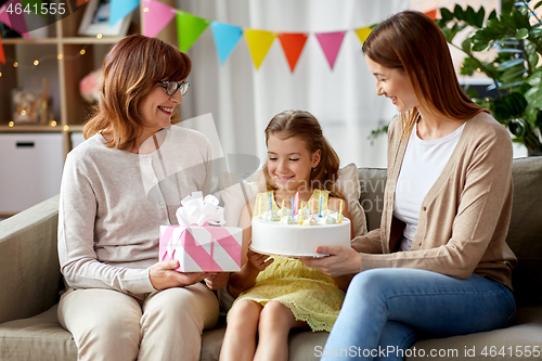 Image of mother, daughter and grandmother on birthday