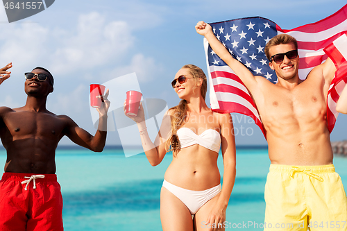 Image of friends at american independence day beach party