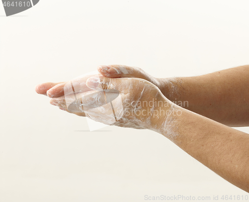 Image of hands with soap foam