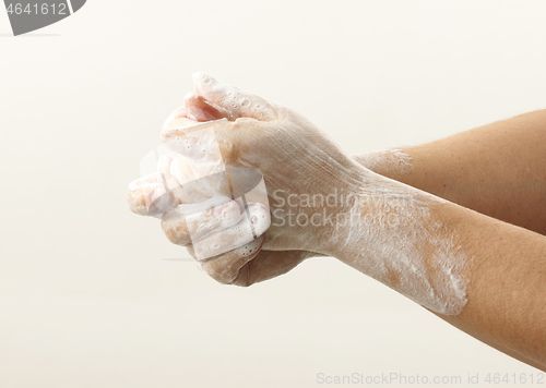 Image of hands with soap foam