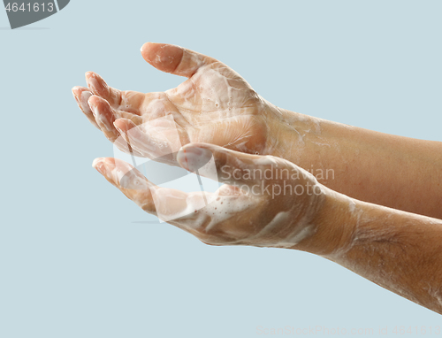 Image of hands with soap foam