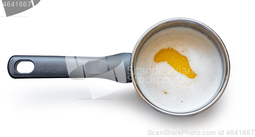 Image of melted butter in a saucepan