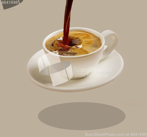 Image of cup of pouring coffee