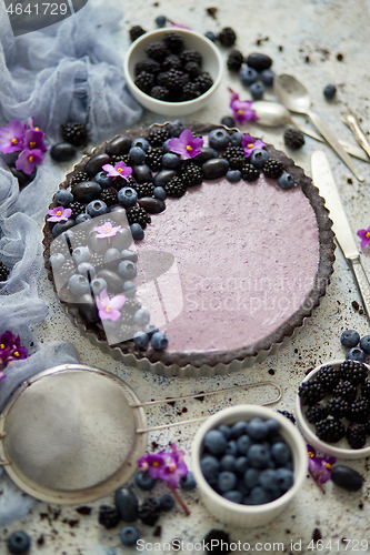 Image of Homemade blackberry tart. Sweet pie with blackberrym blueberry a