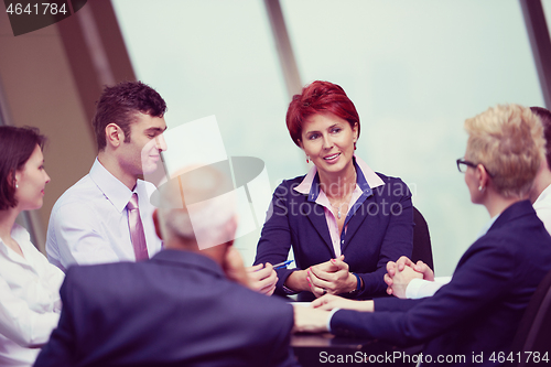 Image of business people group on meeting at modern bright office