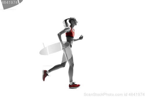 Image of one caucasian woman running on white background