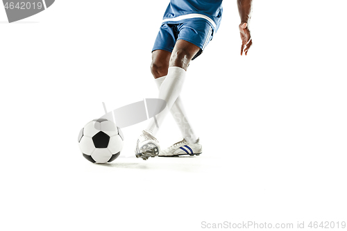 Image of legs of soccer player close-up isolated on white