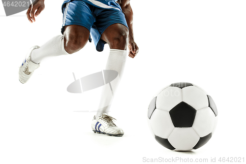 Image of legs of soccer player close-up isolated on white