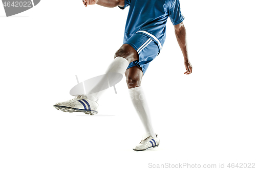 Image of legs of soccer player close-up isolated on white