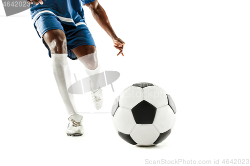 Image of legs of soccer player close-up isolated on white