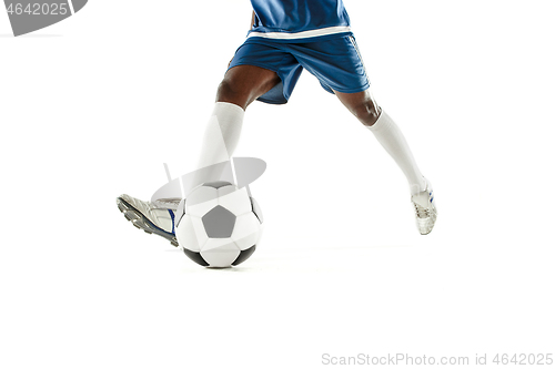 Image of legs of soccer player close-up isolated on white