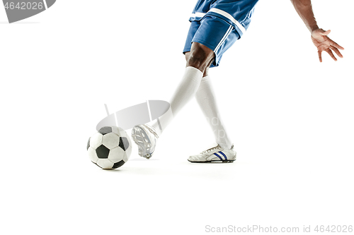 Image of legs of soccer player close-up isolated on white