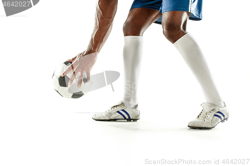 Image of legs of soccer player close-up isolated on white