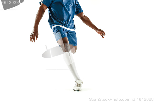 Image of legs of soccer player close-up isolated on white