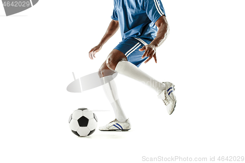 Image of legs of soccer player close-up isolated on white