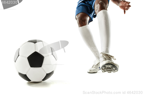 Image of legs of soccer player close-up isolated on white