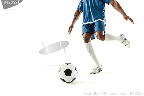 Image of legs of soccer player close-up isolated on white