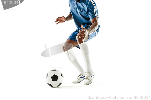 Image of legs of soccer player close-up isolated on white