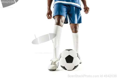 Image of legs of soccer player close-up isolated on white