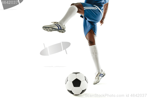 Image of legs of soccer player close-up isolated on white