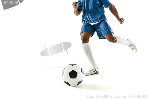 Image of legs of soccer player close-up isolated on white