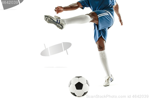 Image of legs of soccer player close-up isolated on white