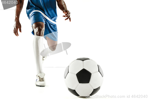 Image of legs of soccer player close-up isolated on white