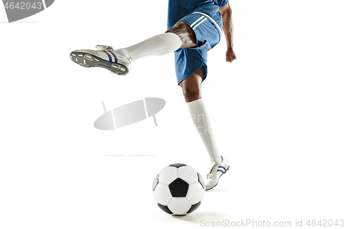 Image of legs of soccer player close-up isolated on white