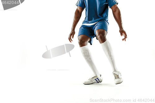 Image of legs of soccer player close-up isolated on white