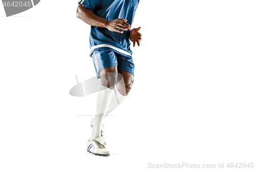 Image of legs of soccer player close-up isolated on white