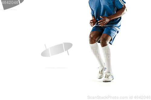 Image of legs of soccer player close-up isolated on white