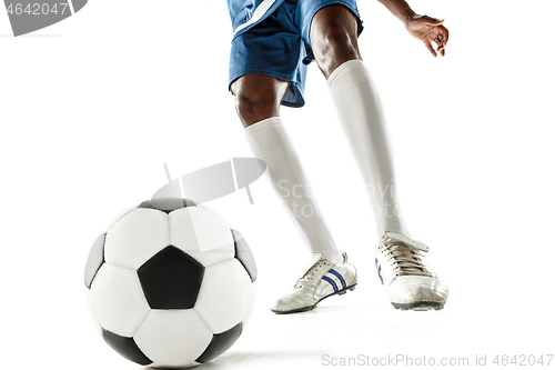 Image of legs of soccer player close-up isolated on white