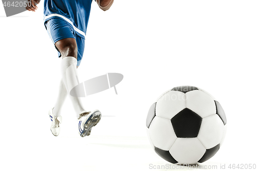 Image of legs of soccer player close-up isolated on white